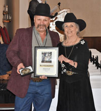 Gerald Payne receiving award