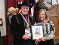 Jay Jones accepting plaque