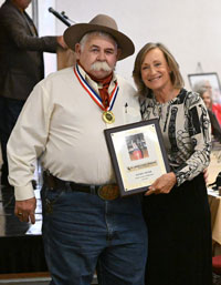 Gene Lyda Accepting Plaque